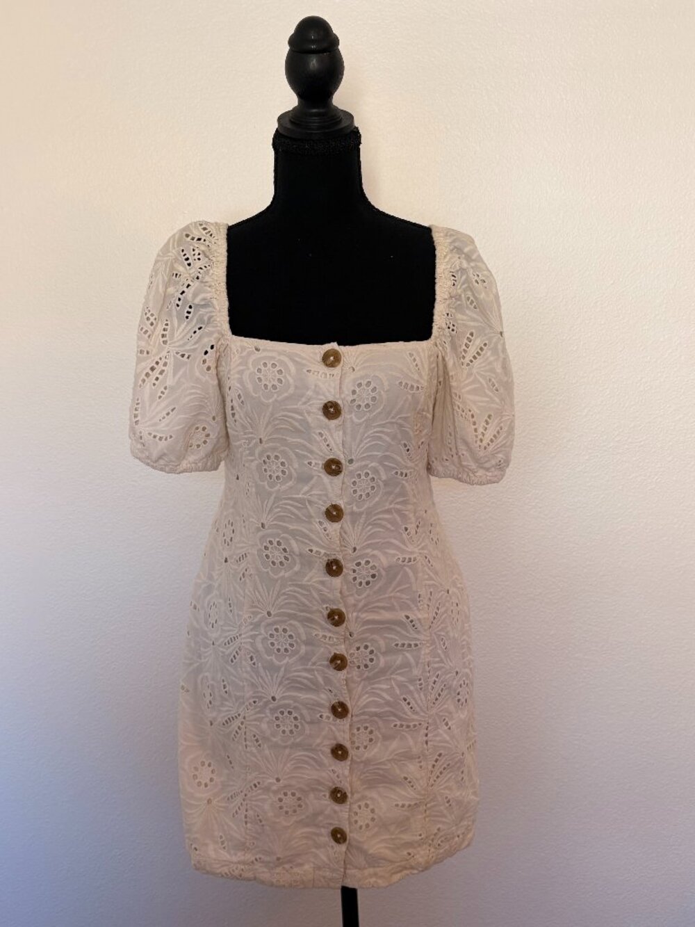 Free People cream eyelet mini dress in size 4.